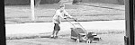 Ryan mowing my lawn (back in May of 2001)
